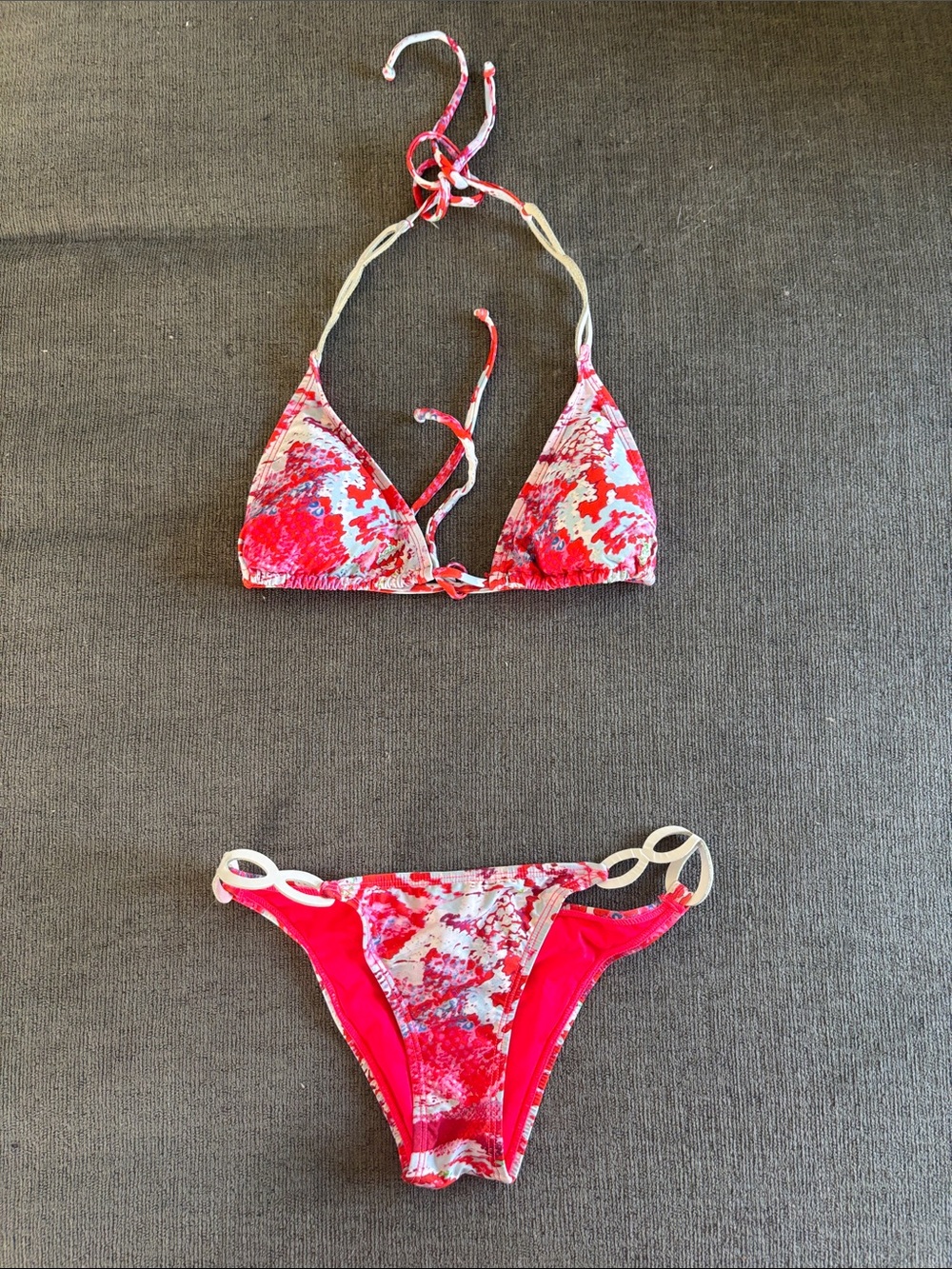 NWOT PQ blue and red snake print set with leather chain details. Size small.